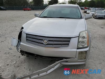 Piąte zdjęcie samochodu w środku: 2004 CADILLAC SRX VIN:1GYDE63A240141274 - miniatura