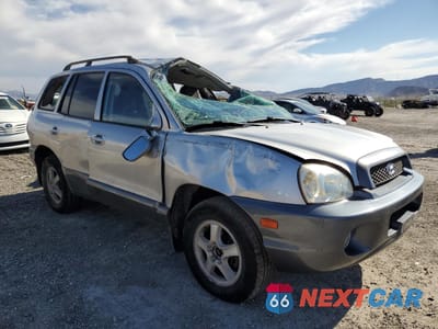 Czwarte zdjęcie samochodu z boku: 2003 HYUNDAI SANTA FE GLS VIN:KM8SC13D63U461796 - miniatura