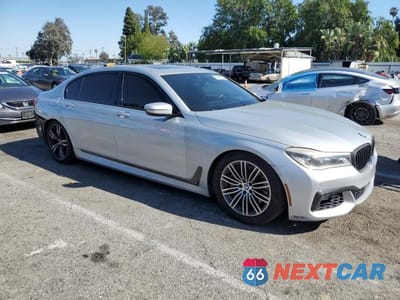 Czwarte zdjęcie samochodu z boku: 2016 BMW 750 XI VIN:WBA7F2C54GG417202 - miniatura
