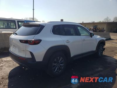 Trzecie zdjęcie samochodu z tyłu: 2023 MAZDA CX-50 PREFERRED PLUS VIN:7MMVABCM5PN146288 - miniatura