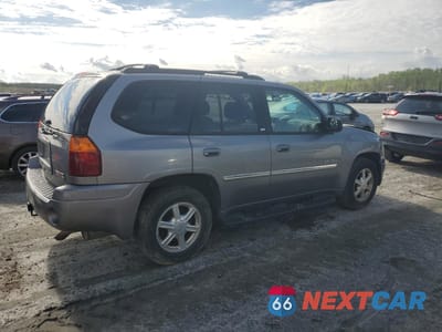 Trzecie zdjęcie samochodu z tyłu: 2006 GMC ENVOY VIN:1GKDT13S762346799 - miniatura