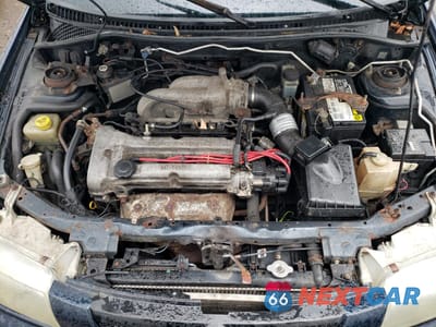 Zdjęcie 11 z 12 samochodu: 1998 MAZDA PROTEGE DX VIN:JM1BC1418W0234016 - miniatura