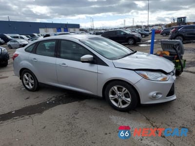 Czwarte zdjęcie samochodu z boku: 2012 FORD FOCUS SE VIN:1FAHP3F27CL448270 - miniatura