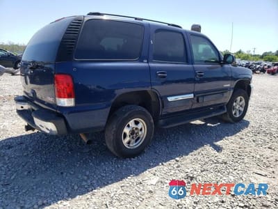 Trzecie zdjęcie samochodu z tyłu: 2003 GMC YUKON VIN:1GKEC13Z73R264611 - miniatura