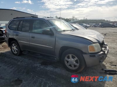 Czwarte zdjęcie samochodu z boku: 2006 GMC ENVOY VIN:1GKDT13S762346799 - miniatura