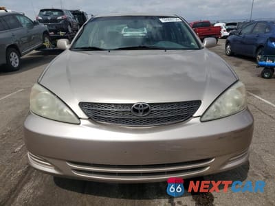 Piąte zdjęcie samochodu w środku: 2002 TOYOTA CAMRY LE VIN:4T1BF30K32U531159 - miniatura