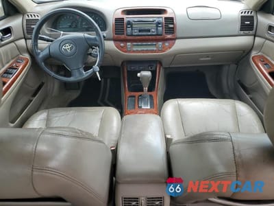 Zdjęcie 8 z 12 samochodu: 2002 TOYOTA CAMRY LE VIN:4T1BF30K32U531159 - miniatura