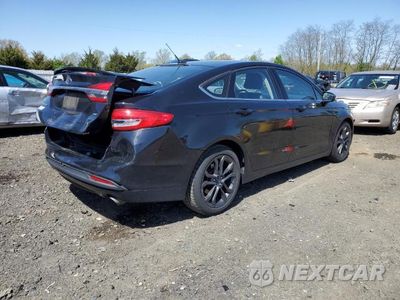 Trzecie zdjęcie samochodu z tyłu: 2018 FORD FUSION SE VIN:3FA6P0H76JR171298 - miniatura