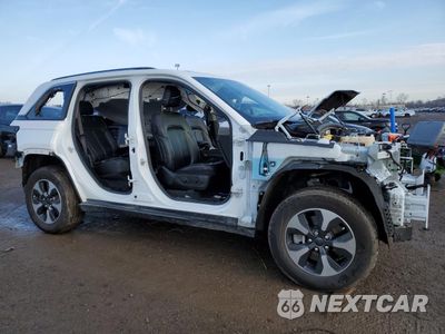 Czwarte zdjęcie samochodu z boku: 2022 JEEP GRAND CHEROKEE LIMITED 4XE VIN:1C4RJYB65N8762026 - miniatura