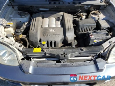 Zdjęcie 13 z 15 samochodu: 2003 HYUNDAI SANTA FE GLS VIN:KM8SC13D63U461796 - miniatura