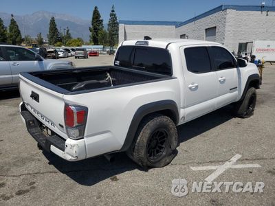 Trzecie zdjęcie samochodu z tyłu: 2022 TOYOTA TACOMA DOUBLE CAB VIN:3TMAZ5CN6NM163982 - miniatura