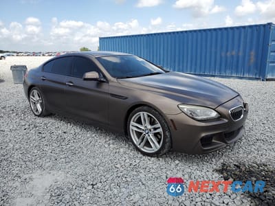 Czwarte zdjęcie samochodu z boku: 2014 BMW 650 XI GRAN COUPE VIN:WBA6B4C56ED760319 - miniatura