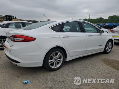 Trzecie zdjęcie samochodu z tyłu: 2018 FORD FUSION SE HYBRID VIN:3FA6P0LU7JR118784 - miniatura