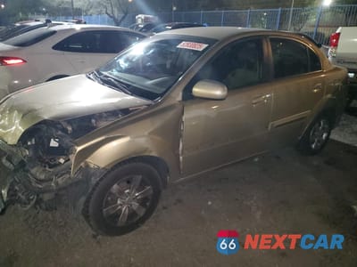 2010 KIA RIO LX KNADH4A31A6684272 - główne zdjęcie licytacji z USA - miniatura