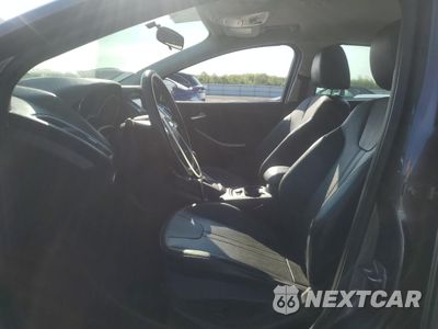 Zdjęcie 7 z 14 samochodu: 2014 FORD FOCUS TITANIUM VIN:1FADP3N24EL269008 - miniatura