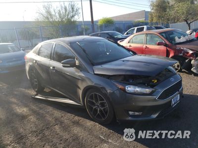 Czwarte zdjęcie samochodu z boku: 2018 FORD FOCUS SEL VIN:1FADP3H27JL304114 - miniatura