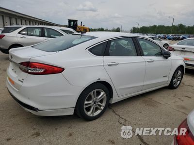 Trzecie zdjęcie samochodu z tyłu: 2018 FORD FUSION SE HYBRID VIN:3FA6P0LU7JR171954 - miniatura