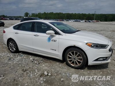 Czwarte zdjęcie samochodu z boku: 2017 FORD FUSION SE HYBRID VIN:3FA6P0LUXHR359670 - miniatura