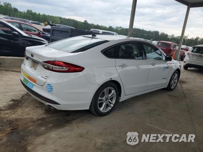 Trzecie zdjęcie samochodu z tyłu: 2018 FORD FUSION SE HYBRID VIN:3FA6P0LU7JR163532 - miniatura