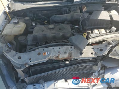 Zdjęcie 12 z 14 samochodu: 2003 FORD FOCUS LX VIN:1FAFP33P23W311601 - miniatura