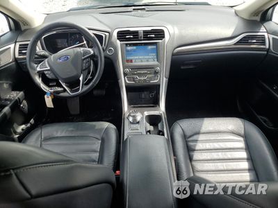 Zdjęcie 8 z 12 samochodu: 2017 FORD FUSION SE HYBRID VIN:3FA6P0LU8HR359599 - miniatura