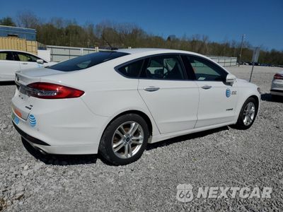Trzecie zdjęcie samochodu z tyłu: 2018 FORD FUSION SE HYBRID VIN:3FA6P0LU5JR172049 - miniatura