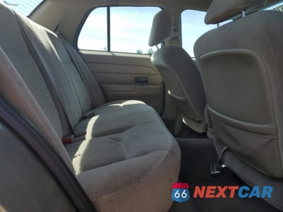 Zdjęcie 10 z 14 samochodu: 2004 FORD CROWN VICTORIA VIN:2FAFP73W84X121726 - miniatura