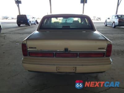 Zdjęcie 6 z 12 samochodu: 1996 LINCOLN TOWN CAR CARTIER VIN:1LNLM83W7TY640188 - miniatura