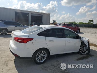 Trzecie zdjęcie samochodu z tyłu: 2016 FORD FOCUS SE VIN:1FADP3F2XGL282928 - miniatura