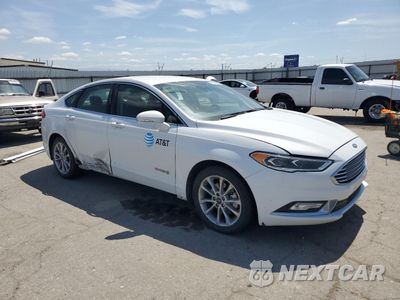 Czwarte zdjęcie samochodu z boku: 2017 FORD FUSION SE HYBRID VIN:3FA6P0LU8HR408915 - miniatura