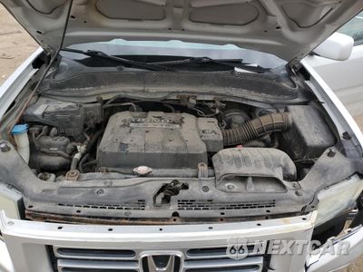 Zdjęcie 11 z 12 samochodu: 2007 HONDA RIDGELINE RTS VIN:2HJYK16477H502678 - miniatura
