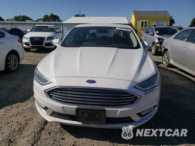 Piąte zdjęcie samochodu w środku: 2017 FORD FUSION SE HYBRID VIN:3FA6P0LU4HR409365 - miniatura
