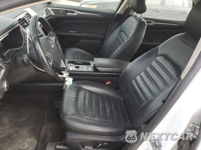 Zdjęcie 7 z 13 samochodu: 2018 FORD FUSION SE HYBRID VIN:3FA6P0LU5JR118699 - miniatura