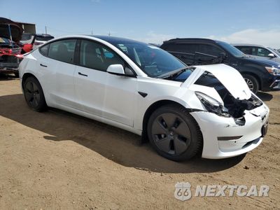 Czwarte zdjęcie samochodu z boku: 2021 TESLA MODEL 3 VIN:5YJ3E1EB7MF009400 - miniatura