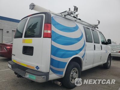 Trzecie zdjęcie samochodu z tyłu: 2014 CHEVROLET EXPRESS G2500 VIN:1GCWGFCB3E1118132 - miniatura