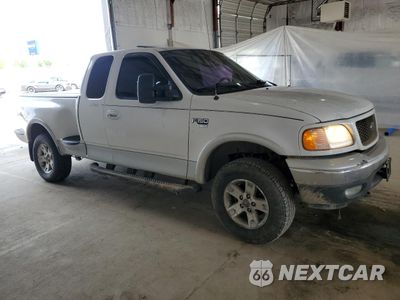 Czwarte zdjęcie samochodu z boku: 2002 FORD F150 VIN:1FTRX08L82KE21764 - miniatura