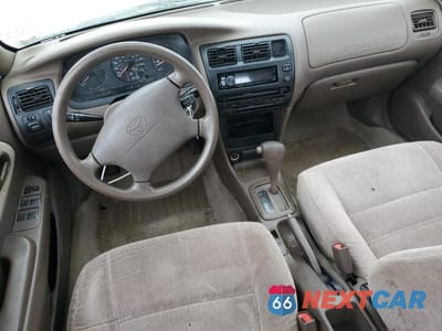 Zdjęcie 8 z 12 samochodu: 1997 TOYOTA COROLLA DX VIN:1NXBB02E8VZ519692 - miniatura