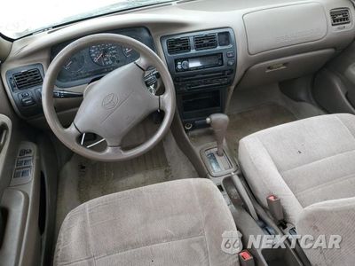 Zdjęcie 8 z 12 samochodu: 1997 TOYOTA COROLLA DX VIN:1NXBB02E8VZ519692 - miniatura
