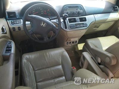 Zdjęcie 8 z 14 samochodu: 2010 HONDA ODYSSEY EXL VIN:5FNRL3H62AB093843 - miniatura