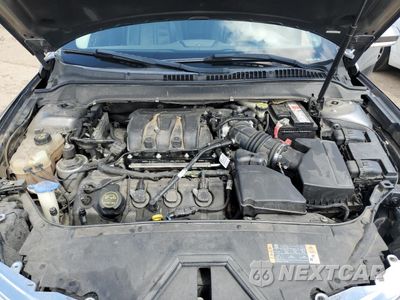 Zdjęcie 11 z 12 samochodu: 2014 LINCOLN MKZ VIN:3LN6L2JK2ER827448 - miniatura