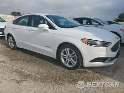 Czwarte zdjęcie samochodu z boku: 2018 FORD FUSION SE HYBRID VIN:3FA6P0LUXJR129973 - miniatura