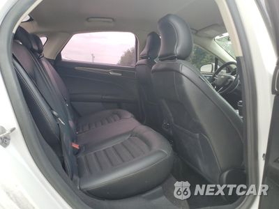 Zdjęcie 10 z 13 samochodu: 2018 FORD FUSION SE HYBRID VIN:3FA6P0LU3JR129801 - miniatura