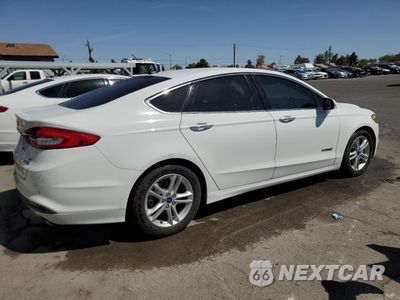 Trzecie zdjęcie samochodu z tyłu: 2018 FORD FUSION SE HYBRID VIN:3FA6P0LU2JR171599 - miniatura