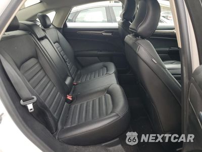 Zdjęcie 10 z 13 samochodu: 2017 FORD FUSION SE HYBRID VIN:3FA6P0LUXHR359636 - miniatura