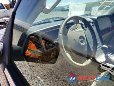 Zdjęcie 9 z 13 samochodu: 2003 LINCOLN NAVIGATOR VIN:5LMFU28R03LJ34130 - miniatura