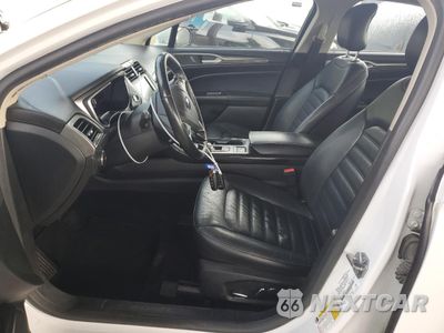 Zdjęcie 7 z 12 samochodu: 2017 FORD FUSION SE HYBRID VIN:3FA6P0LU7HR359688 - miniatura