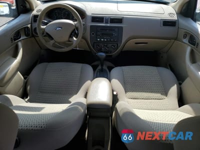 Zdjęcie 8 z 12 samochodu: 2004 FORD FOCUS ZX4 VIN:1FAHP34N06W142317 - miniatura