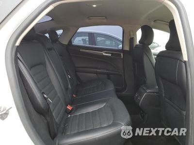Zdjęcie 10 z 13 samochodu: 2017 FORD FUSION SE HYBRID VIN:3FA6P0LU6HR409187 - miniatura