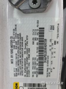Zdjęcie 12 z 13 samochodu: 2017 FORD FUSION SE HYBRID VIN:3FA6P0LUXHR409709 - miniatura