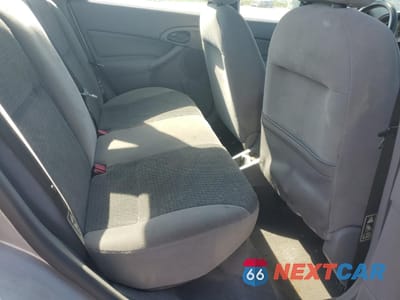 Zdjęcie 11 z 14 samochodu: 2003 FORD FOCUS LX VIN:1FAFP33P23W311601 - miniatura